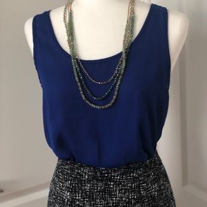 Chiffon tank top in multiple colors.Great 4 layer